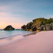 Pink Sand Beaches & Ritzy Resorts: Leave Your Winter Blues Behind For This Underrated Island